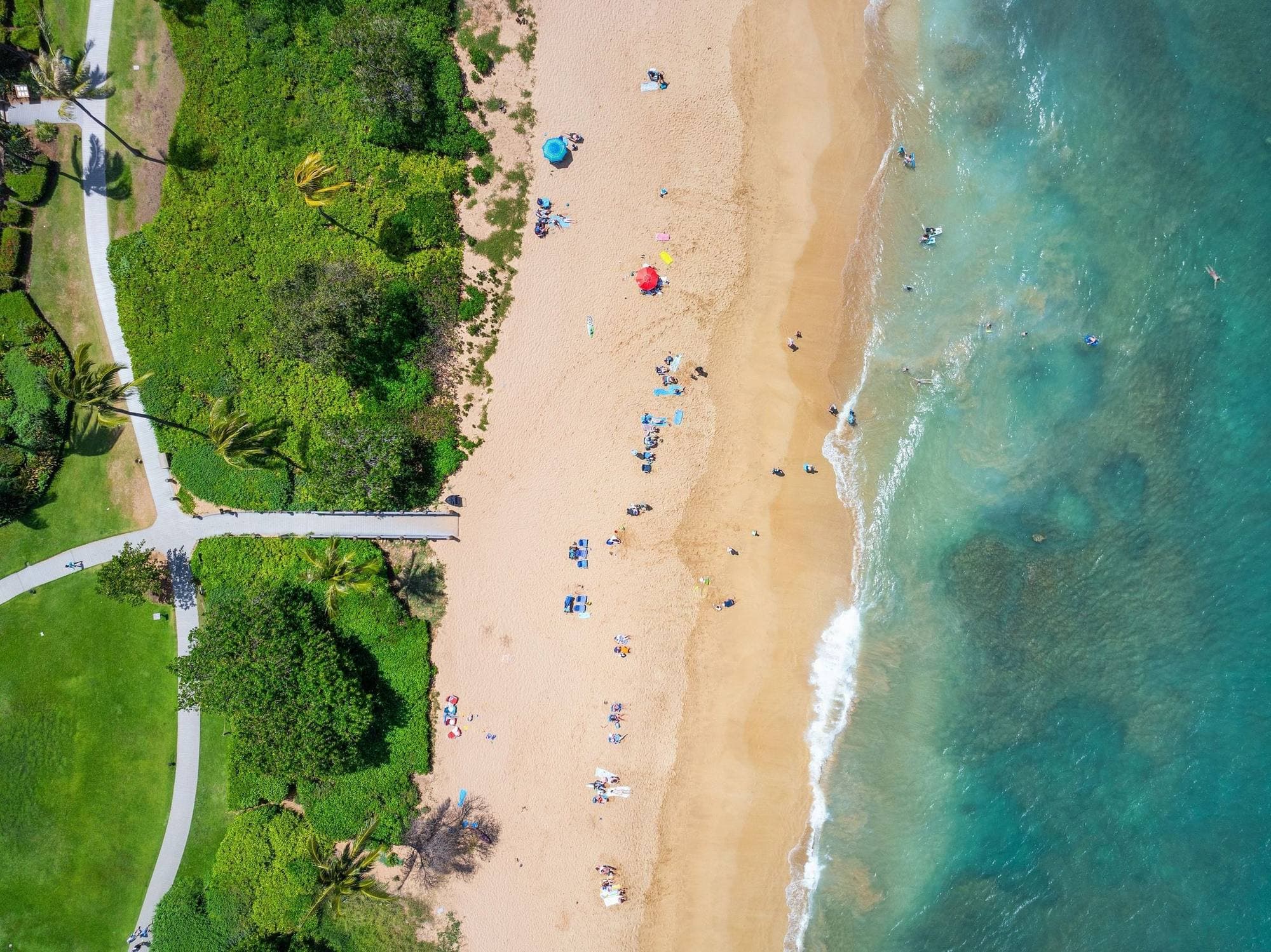 Overhead view of beachgoers on the sand at Kaanapali